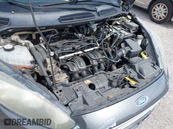 2016 Ford Fiesta SE with VIN 3FADP4EJ4GM129006, listed as a IAAI auction lot 42085892 with 146,044 mi miles. Bid and sale history available at carsss.com. Image 6.
