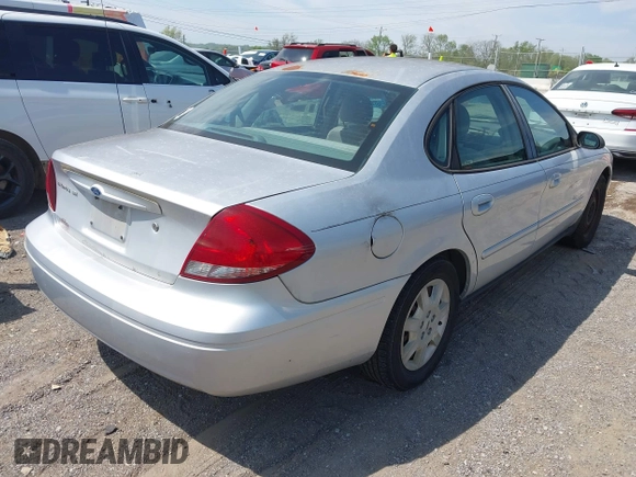 2006 Ford Taurus SE with VIN 1FAFP53U66A101635, listed as a IAAI auction lot 42067998 with 208,734 mi miles. Bid and sale history available at carsss.com. Image 4.