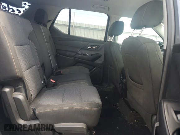 2019 Chevrolet Traverse LS z VIN 1GNERFKW4KJ194696, wystawiony jako Copart lot #51702385 z przebiegiem 129 453 mil mil oraz Szkoda całkowita • Salvage title. Historia ofert i sprzedaży dostępna na DreamBid. Obrazek 11.