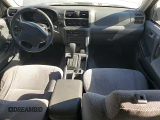 1999 Isuzu Rodeo S with VIN 4S2CK58W7X4357910, listed as a Copart auction lot 86955254 with 105,593 mi miles and Salvage Title. Bid and sale history available at DreamBid. Image 8.