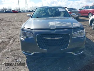 2017 Chrysler 300 with VIN 2C3CCAEG2HH559755, listed as a IAAI auction lot 41854444 with 135,744 mi miles. Bid and sale history available at carsss.com. Image 12.