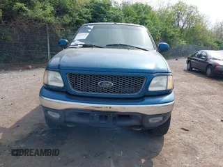 2000 Ford F-150 XL with VIN 1FTRX18W2YNC19493, listed as a IAAI auction lot 42127210 with 115,052 mi miles. Bid and sale history available at carsss.com. Image 6.