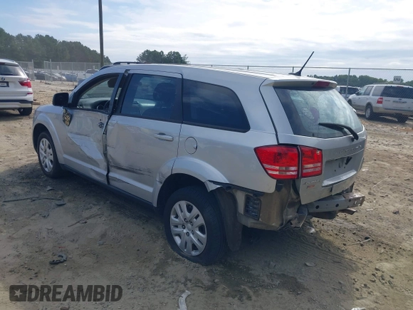 2014 Dodge Journey SE with VIN 3C4PDCAB7ET268221, listed as a IAAI auction lot 40262445 with 153,490 mi miles and . Bid and sale history available at carsss.com. Image 6.