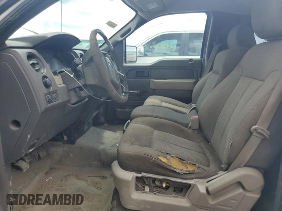 2010 Ford F-150 XL with VIN 1FTMF1CW3AKA19279, listed as a Copart auction lot 61200125 with 223,020 mi miles and Salvage title. Bid and sale history available at DreamBid. Image 7.