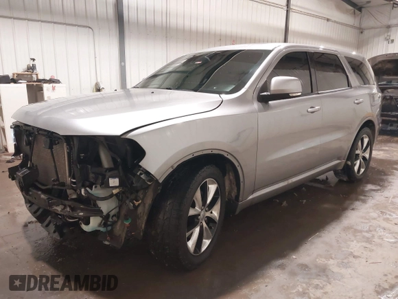 2014 Dodge Durango R/T with VIN 1C4SDJCTXEC558937, listed as a IAAI auction lot 41570244 with 174,724 mi miles and . Bid and sale history available at DreamBid. Image 18.