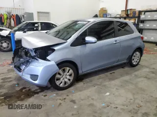 2012 Toyota Yaris L with VIN JTDJTUD32CD517112, listed as a Copart auction lot 87656835 with 113,925 mi miles and Salvage Title. Bid and sale history available at carsss.com. Image 1.