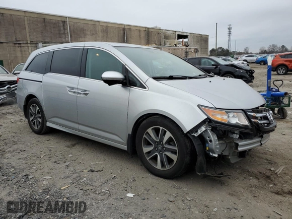2015 Honda Odyssey Touring Elite with VIN 5FNRL5H92FB114509, listed as a Copart auction lot 43801615 with 106,054 mi miles and Salvage title. Bid and sale history available at DreamBid. Image 4.