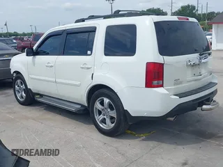 2014 Honda Pilot EX-L with VIN 5FNYF4H52EB055549, listed as a IAAI auction lot 42086456 with 292,594 mi miles and . Bid and sale history available at carsss.com. Image 3.