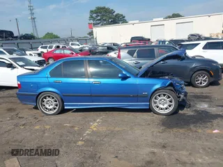1998 BMW 3 Series z VIN WBSCD9324WEE08785, wystawiony jako IAAI lot #42065988 z przebiegiem 202 400 mil mil oraz . Historia ofert i sprzedaży dostępna na DreamBid. Obrazek 13.