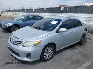 2013 Toyota Corolla L with VIN 2T1BU4EE9DC948109, listed as a IAAI auction lot 42136011 with 166,663 mi miles and . Bid and sale history available at DreamBid. Image 2.