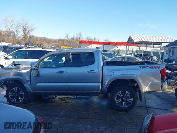 2018 Toyota Tacoma SR with VIN 5TFCZ5AN3JX151479, listed as a IAAI auction lot 41428376 with 104,717 mi miles. Bid and sale history available at carsss.com. Image 14.