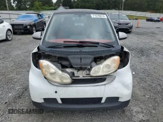 2009 Smart fortwo Pure z VIN WMEEJ31X19K250107, wystawiony jako Copart lot #71576014 z przebiegiem 93 792 mil mil oraz Szkoda całkowita • Salvage title. Historia ofert i sprzedaży dostępna na DreamBid. Obrazek 5.