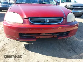 1997 Honda Civic LX with VIN 1HGEJ6678VL030963, listed as a IAAI auction lot 41880866 with 142,472 mi miles. Bid and sale history available at carsss.com. Image 6.