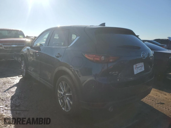 2021 Mazda CX-5 Grand Touring with VIN JM3KFBDM6M1499524, listed as a Copart auction lot 46604635 with 47,799 mi miles and Salvage Title. Bid and sale history available at carsss.com. Image 2.