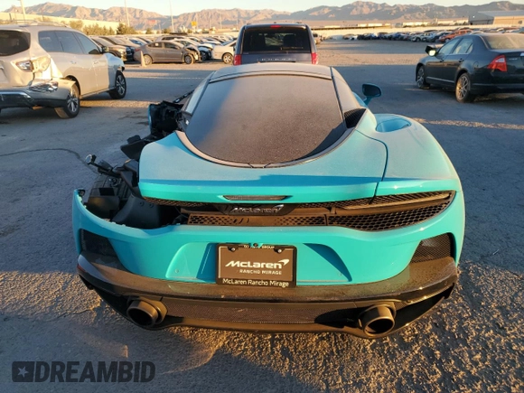2023 McLaren GT z VIN SBM22GCA0PW002765, wystawiony jako Copart lot #78866364 z przebiegiem Nie podano mil oraz Szkody całkowita. Historia ofert i sprzedaży dostępna na DreamBid. Obrazek 6.