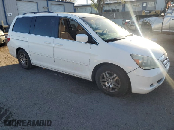 2005 Honda Odyssey EX with VIN 5FNRL38455B400989, listed as a Copart auction lot 50576265 with 132,131 mi miles and Salvage Title. Bid and sale history available at carsss.com. Image 4.