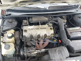 1999 Saturn SL with VIN 1G8ZH5284XZ318834, listed as a IAAI auction lot 41486518 with 178,227 mi miles. Bid and sale history available at carsss.com. Image 10.