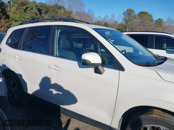 2014 Subaru Forester XT Touring with VIN JF2SJGPC9EH417920, listed as a IAAI auction lot 41270689 with 184,976 mi miles and . Bid and sale history available at DreamBid. Image 13.