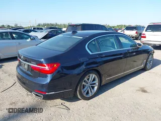 2018 BMW 7 Series ALPINA B7 xDrive with VIN WBA7F2C59JG424704, listed as a IAAI auction lot 42070608 with 56,690 mi miles and . Bid and sale history available at carsss.com. Image 4.
