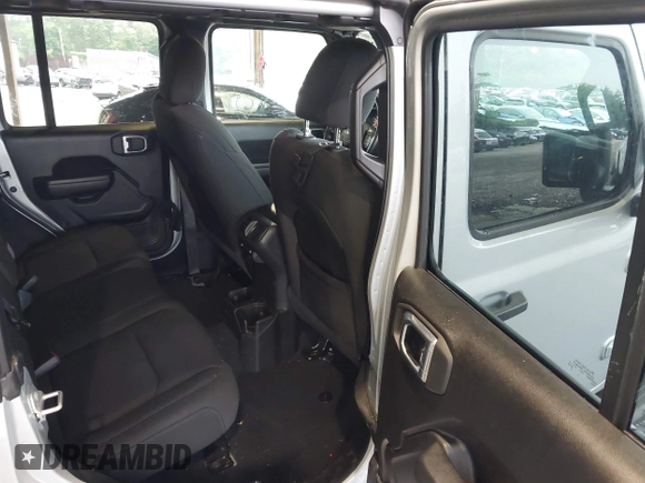 2022 Jeep Wrangler Unlimited Sport S with VIN 1C4HJXDG6NW144396, listed as a IAAI auction lot 42362283 with 19,854 mi miles and . Bid and sale history available at DreamBid. Image 8.