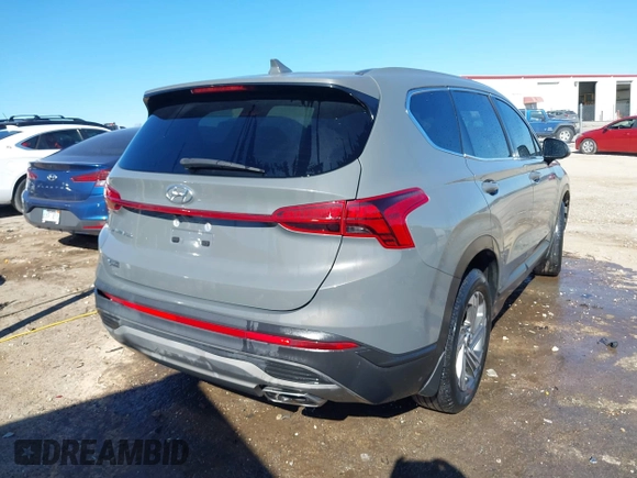 2021 Hyundai Santa Fe SE with VIN 5NMS14AJ6MH346371, listed as a IAAI auction lot 41690034 with 88,069 mi miles. Bid and sale history available at carsss.com. Image 4.