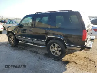1997 GMC Yukon with VIN 1GKEK13R4VJ752757, listed as a Copart auction lot 75574214 with 251,193 mi miles and Clean Title. Bid and sale history available at carsss.com. Image 2.