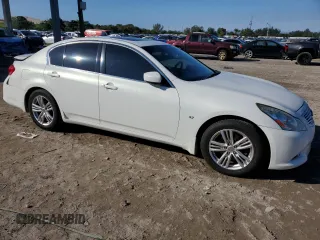 2015 Infiniti Q40 with VIN JN1CV6AP4FM501880, listed as a Copart auction lot 85672324 with 114,221 mi miles and Salvage Title. Bid and sale history available at carsss.com. Image 4.