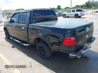 2003 Ford F-150 XLT with VIN 1FTRW07673KD87283, listed as a IAAI auction lot 42687687 with 339,160 mi miles and . Bid and sale history available at DreamBid. Image 3.