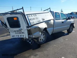 2004 Chevrolet Silverado 1500 LS with VIN 2GCEC19T641328758, listed as a IAAI auction lot 41296030 with 233,459 mi miles. Bid and sale history available at carsss.com. Image 4.