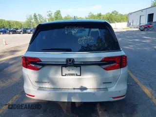 2022 Honda Odyssey Touring with VIN 5FNRL6H88NB026592, listed as a IAAI auction lot 42367048 with 57,066 mi miles and . Bid and sale history available at DreamBid. Image 16.