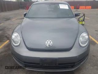2013 Volkswagen Beetle 2.5L with VIN 3VWJP7AT6DM667477, listed as a IAAI auction lot 42215545 with 87,392 mi miles and . Bid and sale history available at DreamBid. Image 12.