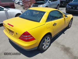 1999 Mercedes-Benz SLK 230/320 with VIN WDBKK47F7XF131839, listed as a IAAI auction lot 42648299 with 124,630 mi miles and . Bid and sale history available at DreamBid. Image 4.