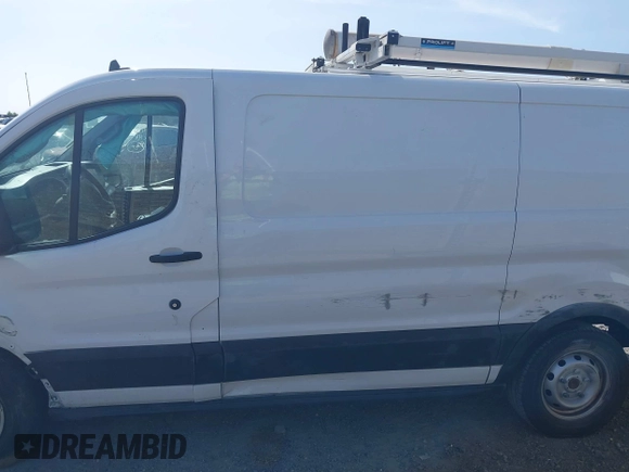 2023 Ford Transit Cargo z VIN 1FTYE1Y81PKB53926, wystawiony jako IAAI lot #42514906 z przebiegiem 52 410 mil mil oraz . Historia ofert i sprzedaży dostępna na DreamBid. Obrazek 14.