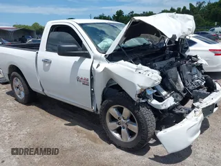 2021 Ram 1500 Tradesman z VIN 3C6JR6AG9MG513085, wystawiony jako IAAI lot #42772495 z przebiegiem 69 532 mil mil oraz . Historia ofert i sprzedaży dostępna na DreamBid. Obrazek 1.