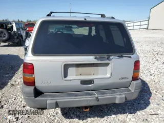 1997 Jeep Grand Cherokee Laredo with VIN 1J4GZ58S5VC561060, listed as a Copart auction lot 52098315 with 267,245 mi miles and Salvage title. Bid and sale history available at DreamBid. Image 6.