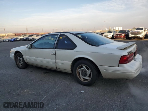 1996 Ford Thunderbird LX z VIN 1FALP62W0TH162431, wystawiony jako Copart lot #41864445 z przebiegiem 183 798 mil mil oraz Szkoda całkowita • Salvage title. Historia ofert i sprzedaży dostępna na DreamBid. Obrazek 2.