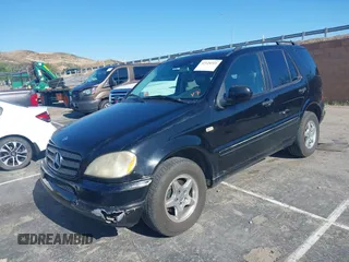 2001 Mercedes-Benz M-Class with VIN 4JGAB54E01A272539, listed as a IAAI auction lot 42124321 with 272,098 mi miles. Bid and sale history available at carsss.com. Image 17.