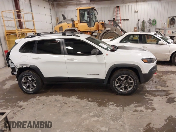 2019 Jeep Cherokee Trailhawk with VIN 1C4PJMBX4KD390061, listed as a IAAI auction lot 42007112 with 72,227 mi miles and . Bid and sale history available at DreamBid. Image 13.