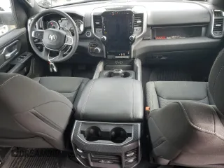 2025 Ram 1500 Big Horn with VIN 1C6RRFFG9SN512549, listed as a Copart auction lot 46062015 with 11,890 mi miles and Salvage Title. Bid and sale history available at carsss.com. Image 8.
