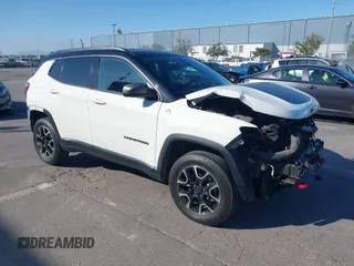 2020 Jeep Compass Trailhawk with VIN 3C4NJDDB4LT144129, listed as a IAAI auction lot 42582688 with 67,112 mi miles and . Bid and sale history available at DreamBid. Image 1.