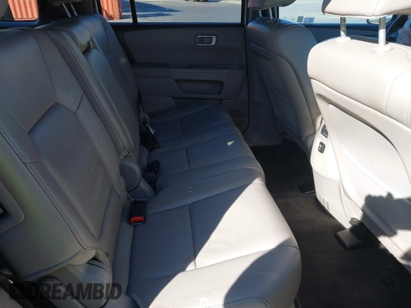 2012 Honda Pilot EX-L z VIN 5FNYF3H50CB021150, wystawiony jako IAAI lot #41337663 z przebiegiem Nie podano mil oraz . Historia ofert i sprzedaży dostępna na DreamBid. Obrazek 8.