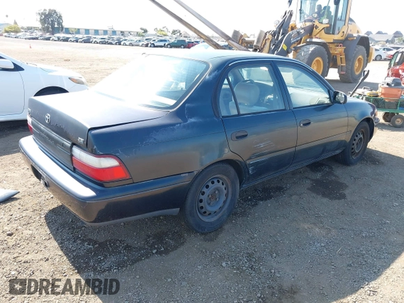 1997 Toyota Corolla with VIN 1NXBA02E7VZ601593, listed as a IAAI auction lot 42771723 with 247,823 mi miles and . Bid and sale history available at DreamBid. Image 4.