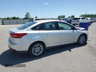 2018 Ford Focus SE with VIN 1FADP3FE0JL202442, listed as a Copart auction lot 53468725 with 106,119 mi miles and Salvage title. Bid and sale history available at DreamBid. Image 3.