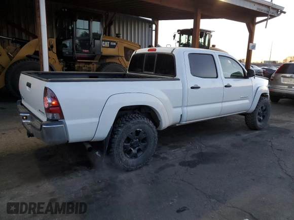 2012 Toyota Tacoma with VIN 3TMMU4FN0CM043190, listed as a Copart auction lot 49410125 with 126,449 mi miles and Salvage title. Bid and sale history available at DreamBid. Image 3.