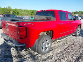 2014 Chevrolet Silverado 1500 LTZ with VIN 3GCUKSEC2EG300040, listed as a IAAI auction lot 42037164 with 64,271 mi miles. Bid and sale history available at carsss.com. Image 4.