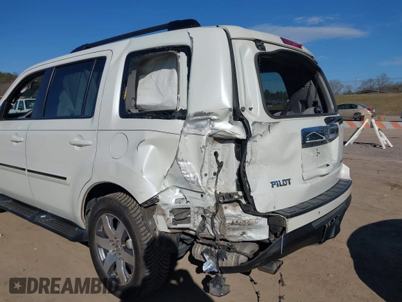 2015 Honda Pilot Touring with VIN 5FNYF3H97FB023842, listed as a IAAI auction lot 41673881 with 106,110 mi miles. Bid and sale history available at carsss.com. Image 6.