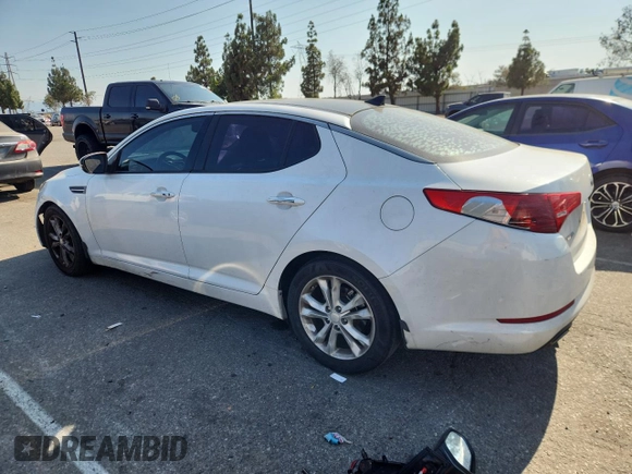 2013 Kia Optima EX with VIN 5XXGN4A71DG196229, listed as a Copart auction lot 64989055 with 146,187 mi miles and Salvage title. Bid and sale history available at DreamBid. Image 2.