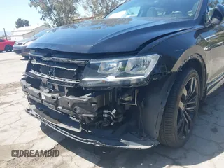 2021 Volkswagen Tiguan SE with VIN 3VV3B7AX0MM015825, listed as a IAAI auction lot 41955268 with 57,909 mi miles and . Bid and sale history available at DreamBid. Image 6.