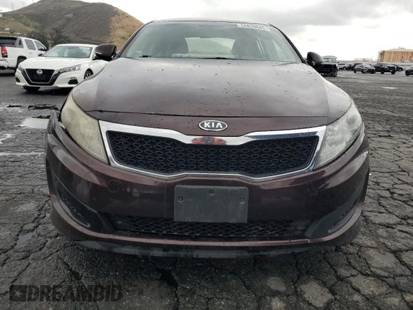 2011 Kia Optima LX z VIN KNAGM4A72B5116910, wystawiony jako Copart lot #55839845 z przebiegiem 187 943 mil mil oraz Szkoda całkowita • Salvage title. Historia ofert i sprzedaży dostępna na DreamBid. Obrazek 5.