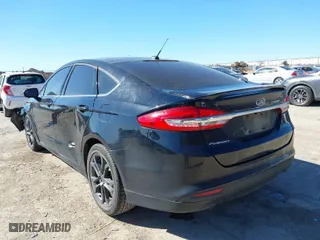 2018 Ford Fusion SE with VIN 3FA6P0H77JR180057, listed as a IAAI auction lot 41729451 with 122,200 mi miles. Bid and sale history available at carsss.com. Image 3.